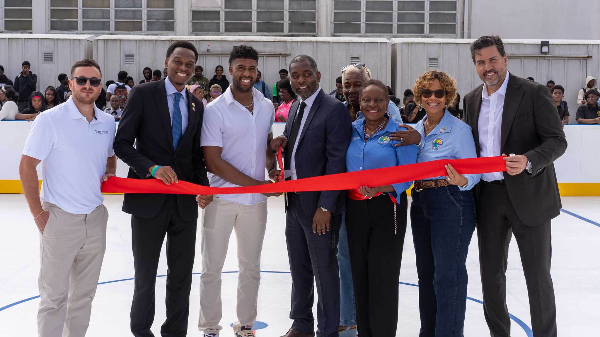 Ribbon-cutting at the Boyd Anderson High School rink with NHL and NHLPA partners